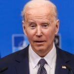 Fundador de Cardano furioso por el nuevo informe anti-cryptos de Biden